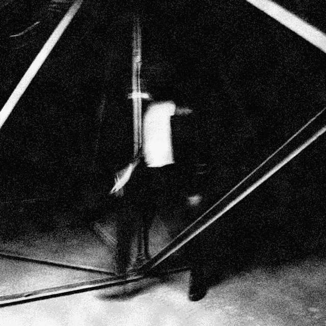 Ottoman Grüw among steel beams. Photography: Sara Hamedi. Black-and-white photocopy-style print treatment.