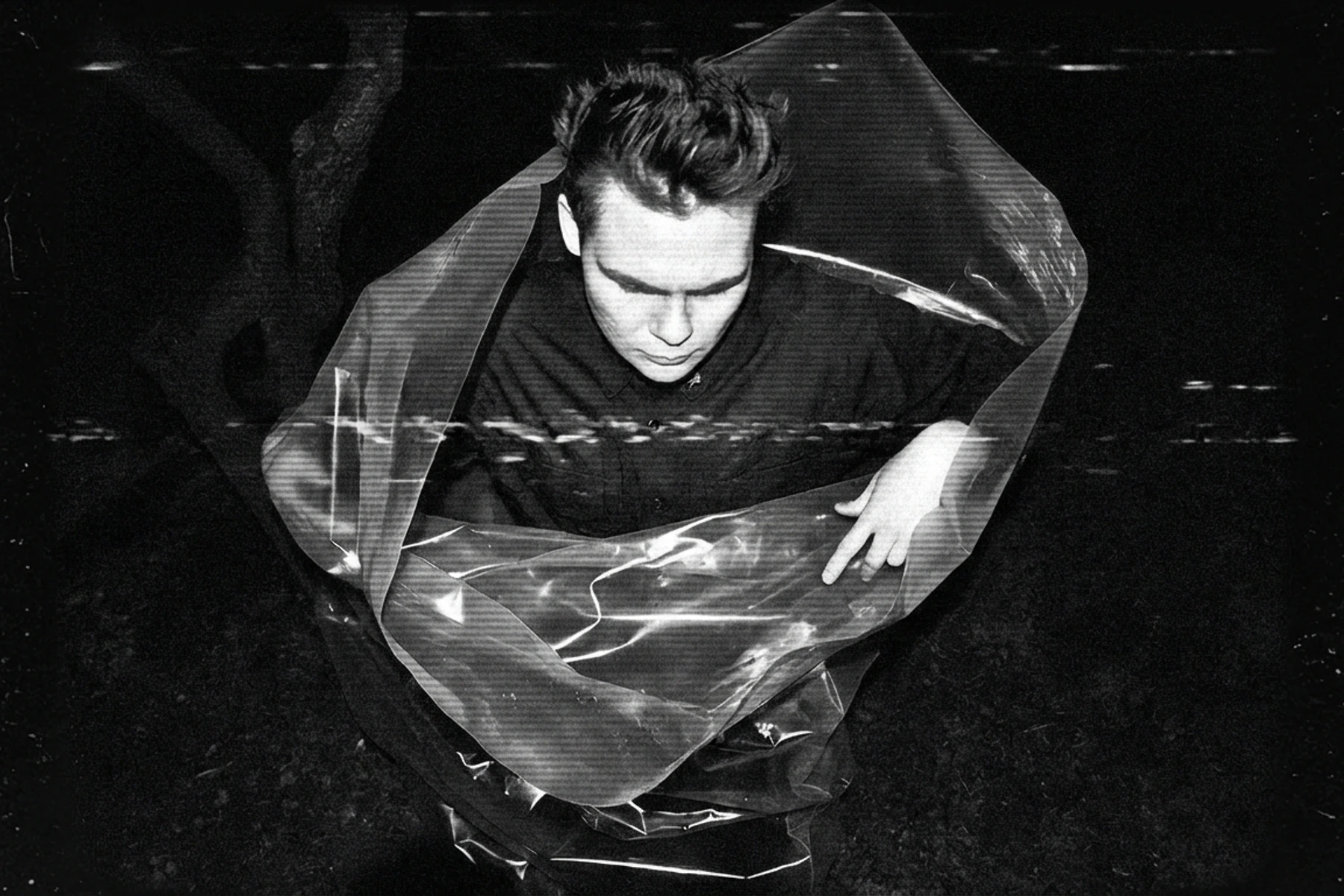 Qual — archival artist photograph.
