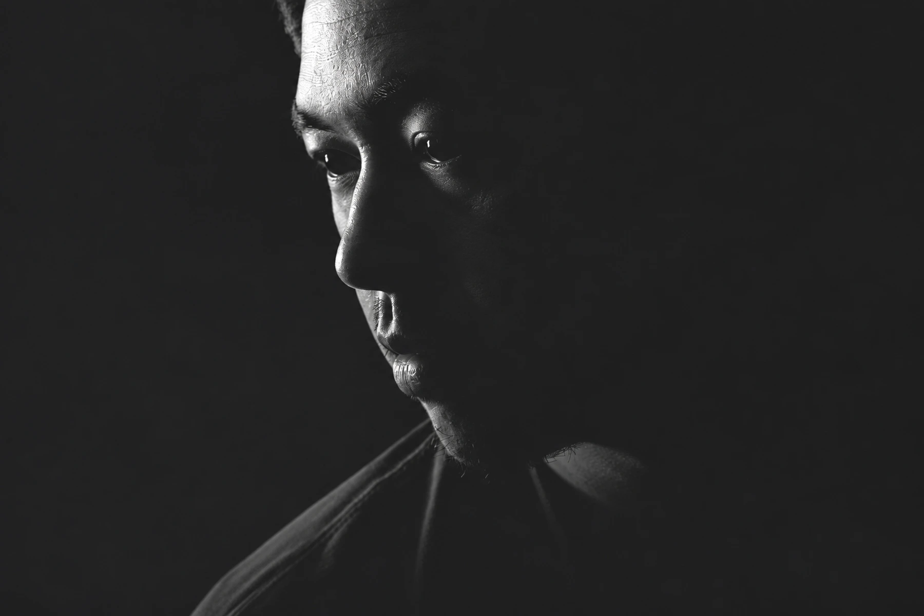 Yu Asaeda / ENA in a black-and-white portrait.
