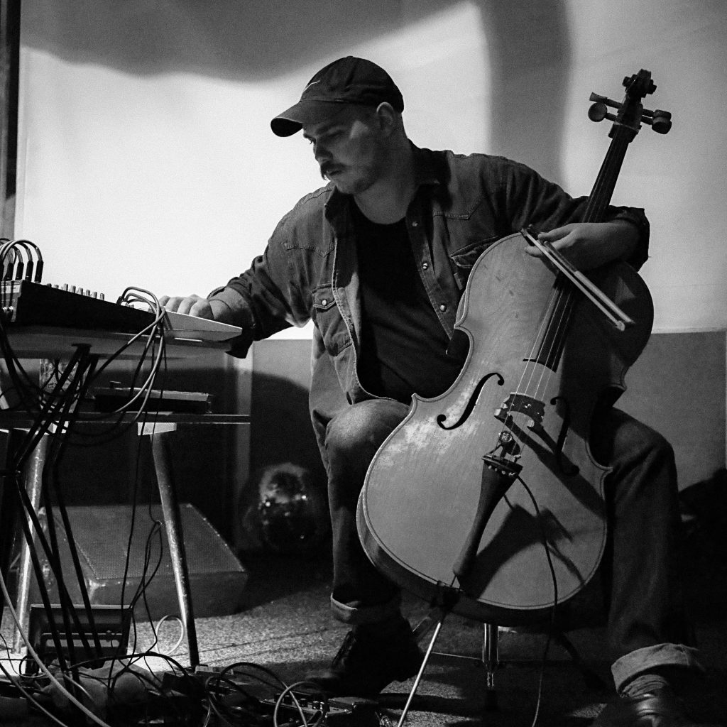 Patris playing cello and electronics