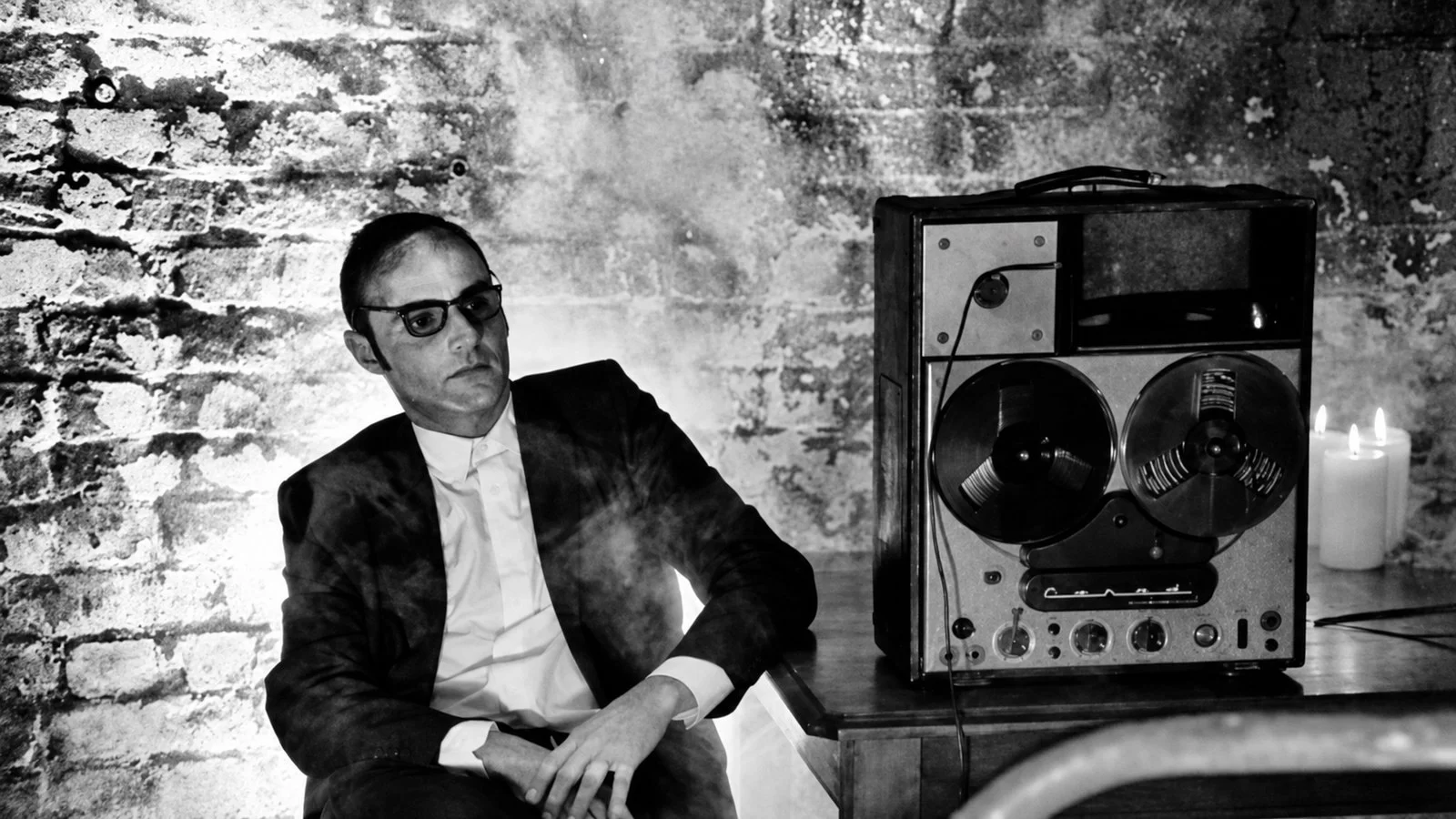 Pepijn Caudron of Kreng with recording equipment and candles