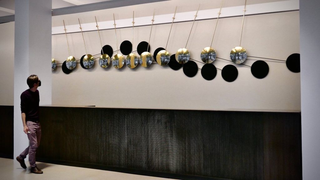 AION — suspended reflective pendulums
