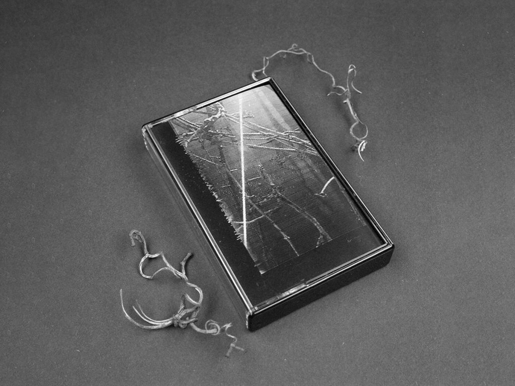 TIESE — Ex Nullo: cassette case and cover at an angle
